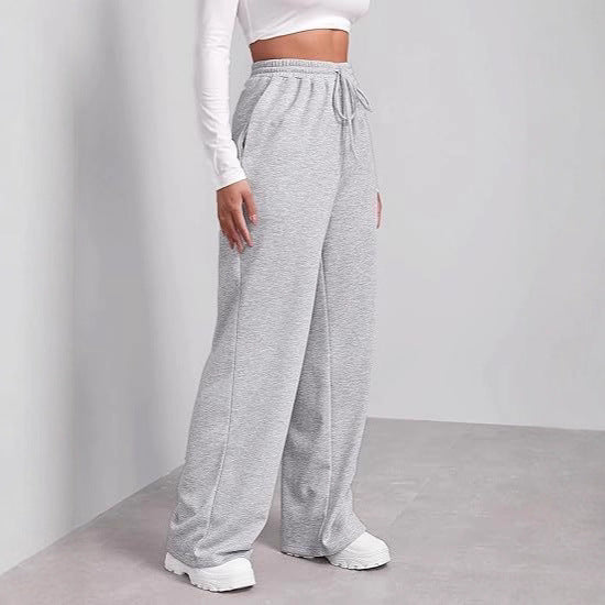 Women's loose-fitting leisure pants with elastic waistband and side pockets Chic & Stil