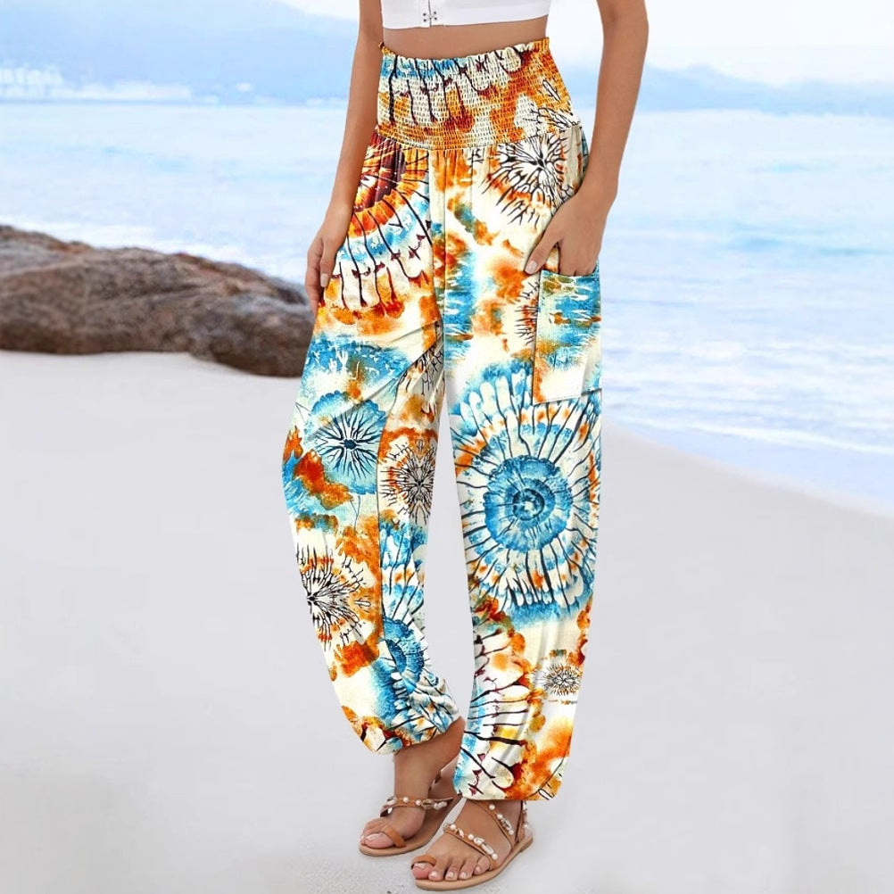 Wide Palazzo pants for women with colorful Paisley pattern and elastic waistband Lune London