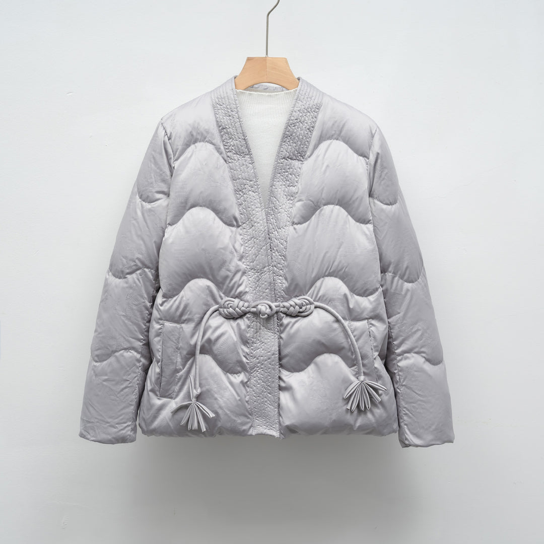 Ladies oversized quilted jacket with drawstring waist and elegant structure Lune London