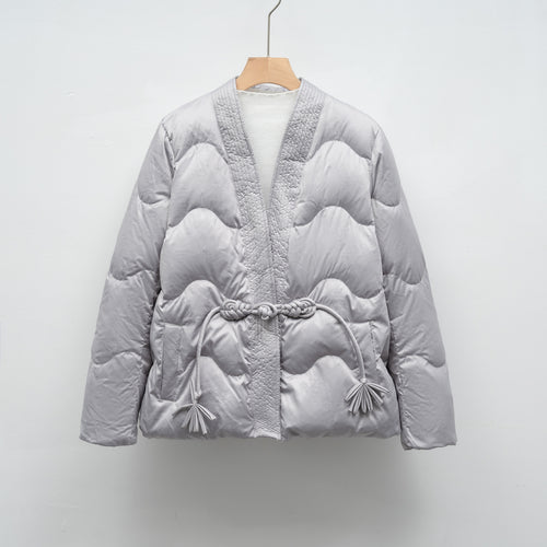 Ladies oversized quilted jacket with drawstring waist and elegant structure Lune London