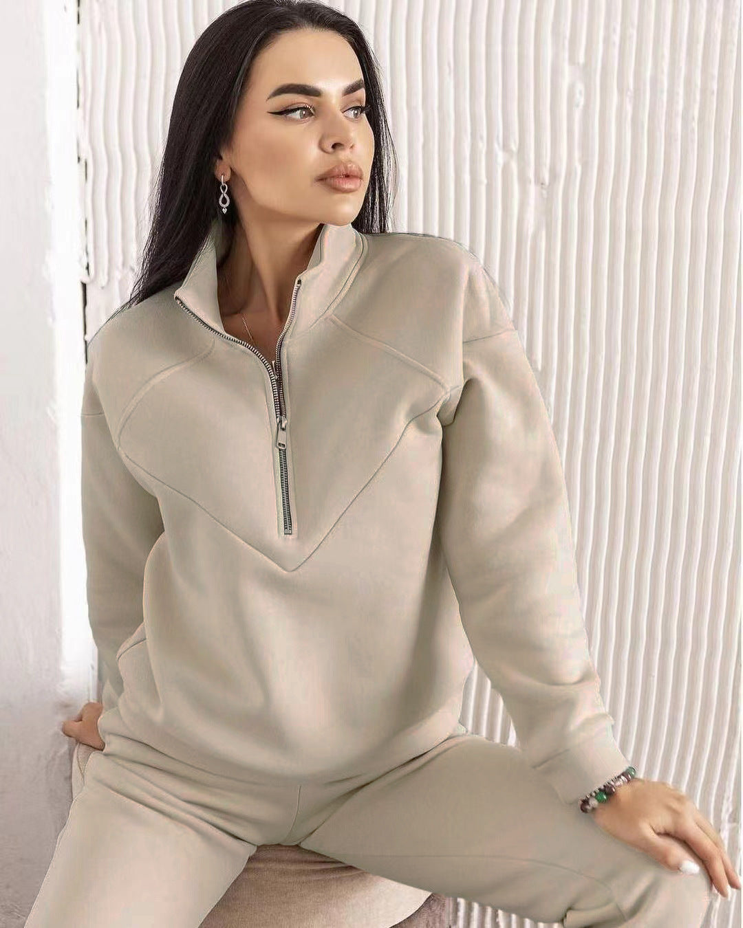 Women's sports training jacket with high collar and practical pockets Lune London