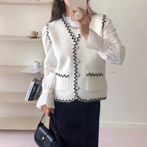 Knit vest for ladies with pearl buttons and contrasting details Lune London