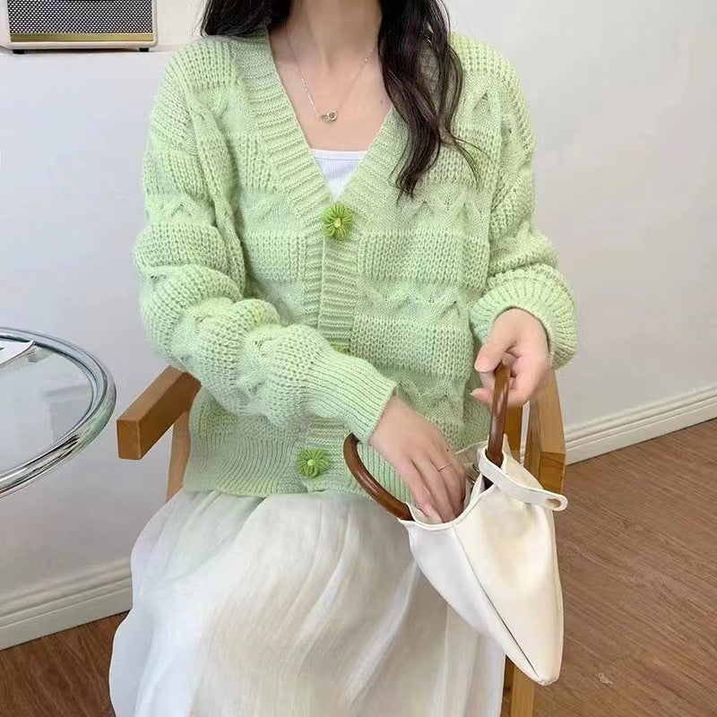 Ladies comfortable knit cardigan with cable pattern and button details Lune London