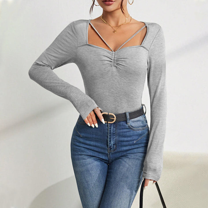 Body à manches longues pour femme avec décolleté en V tendance et détails raffinés aux épaules Chic & Stil