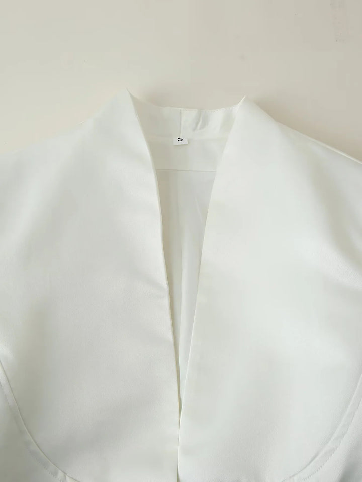 Fitted blouse for women with modern button details and a high collar Lune London