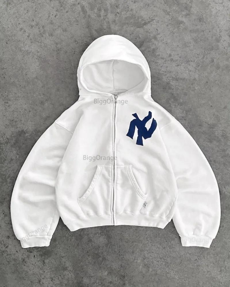 Sweat à capuche femme avec coupe oversize et poche kangourou pratique Chic & Stil