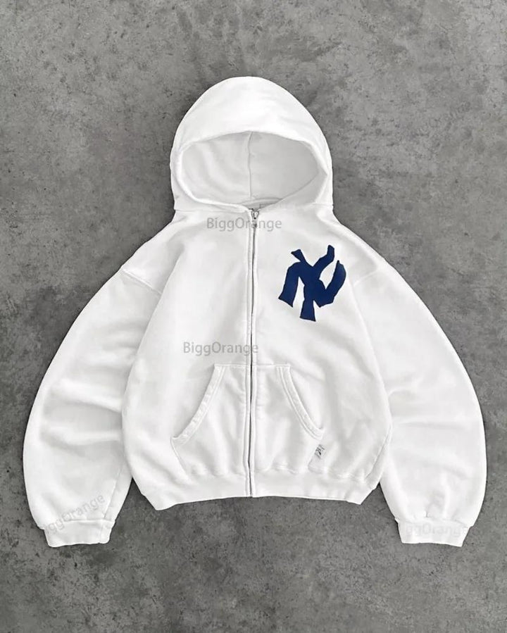 Sweat à capuche femme avec coupe oversize et poche kangourou pratique Chic & Stil