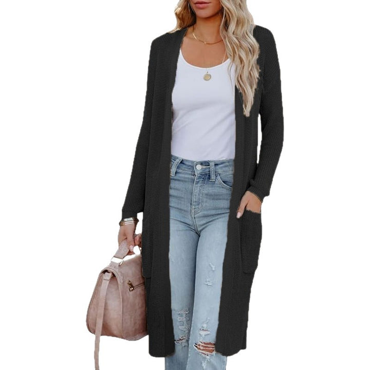 Ladies Long knitted cardigan with an elegant open design and practical pockets Lune London
