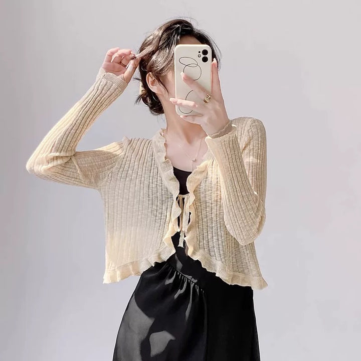 Women's knitted jacket with ruffle details and airy structure Lune London