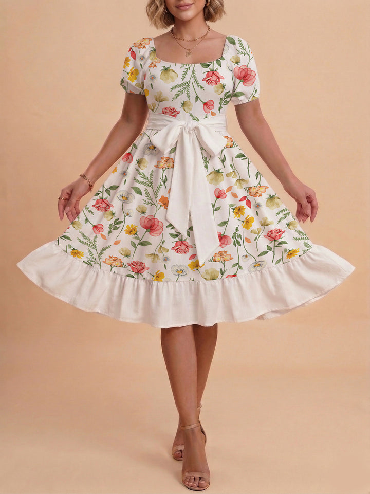 Women's floral dress with adjustable belt and voluminous sleeves Lune London