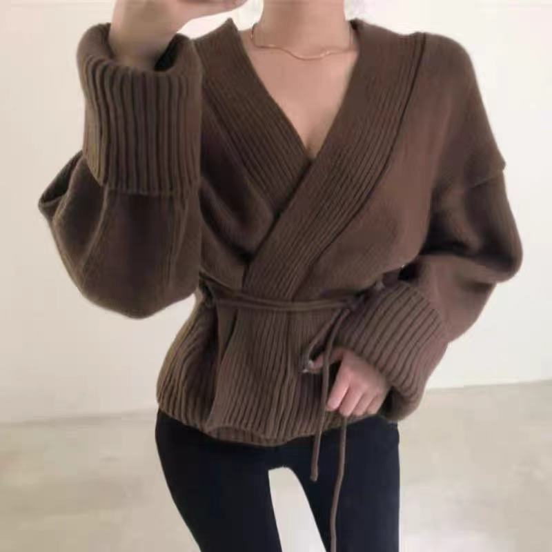 Women’s wrap knit jacket with structured design and wide sleeves Lune London
