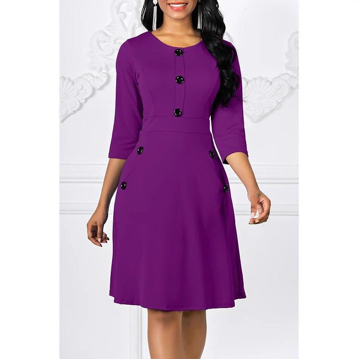Classic three-quarter sleeve dress for women with buttoned details Lune London