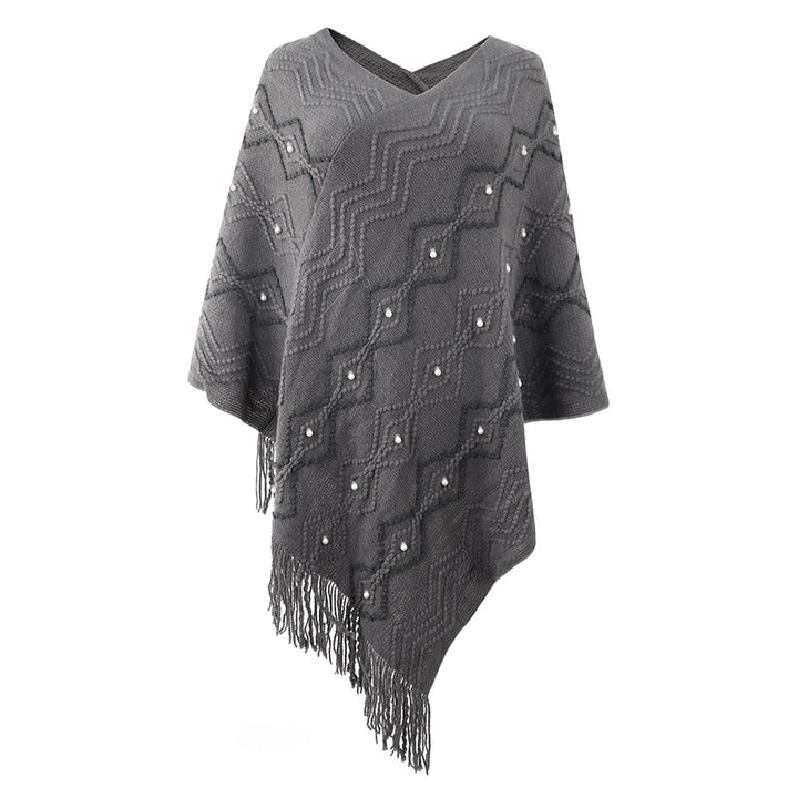 Lune London Elegant poncho for women with a striking textured pattern and decorative fringes