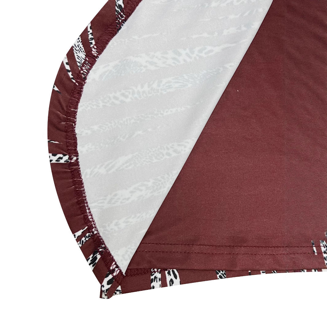 Women's top with decorative knot details and a modern pattern Lune London