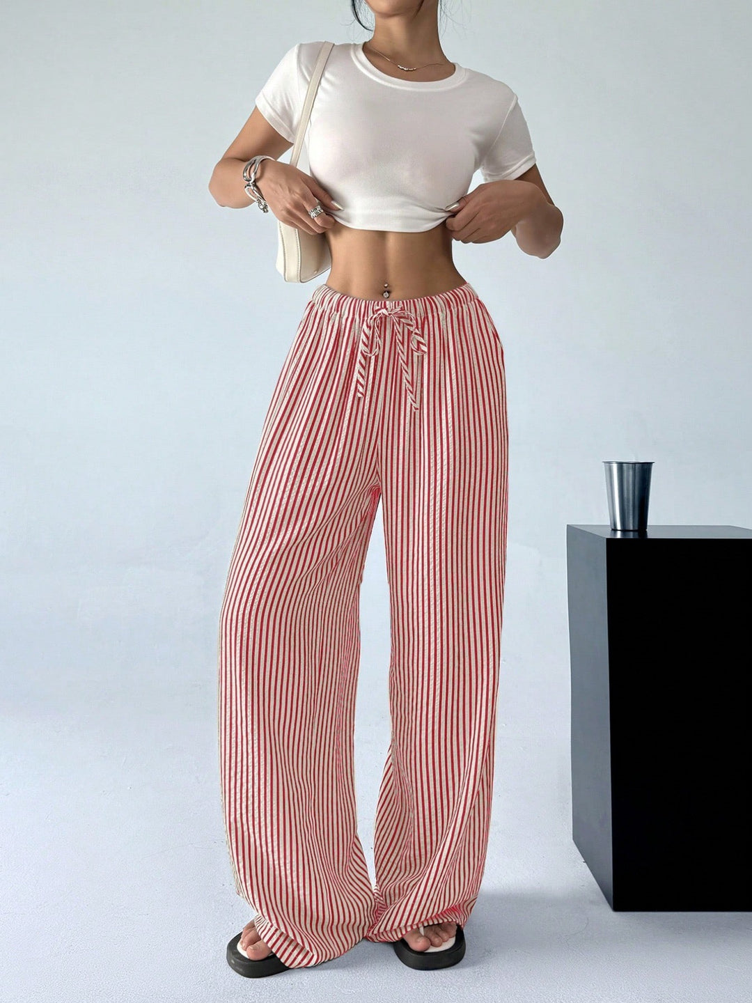 Elegant wide knit trousers for women with discreet striped pattern Lune London