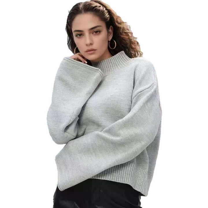 Trendy oversized knit sweater for women with wide sleeves and a high collar Lune London