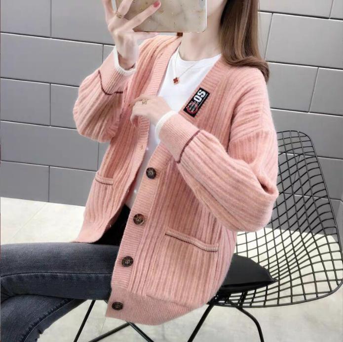 Cardigan for women with textured ribbed pattern and practical pockets Lune London