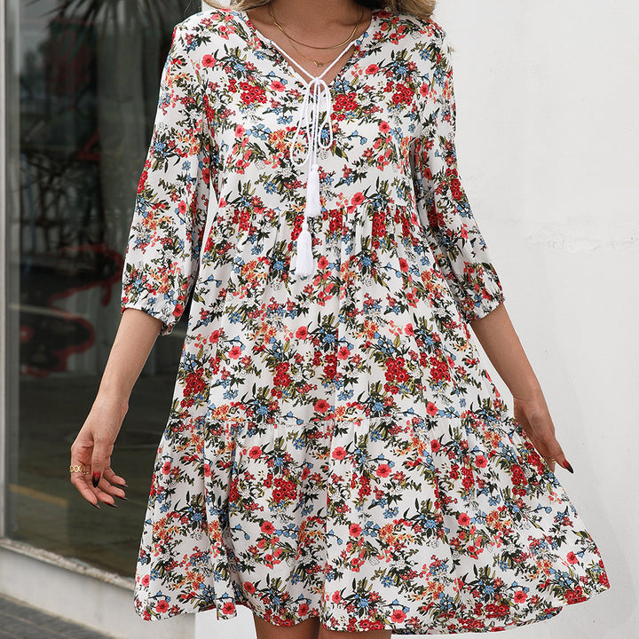 Light floral dresses for women with ruffle details and tie Lune London