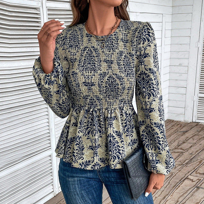 Elegant shirt for women with voluminous sleeves and a floral pattern Lune London