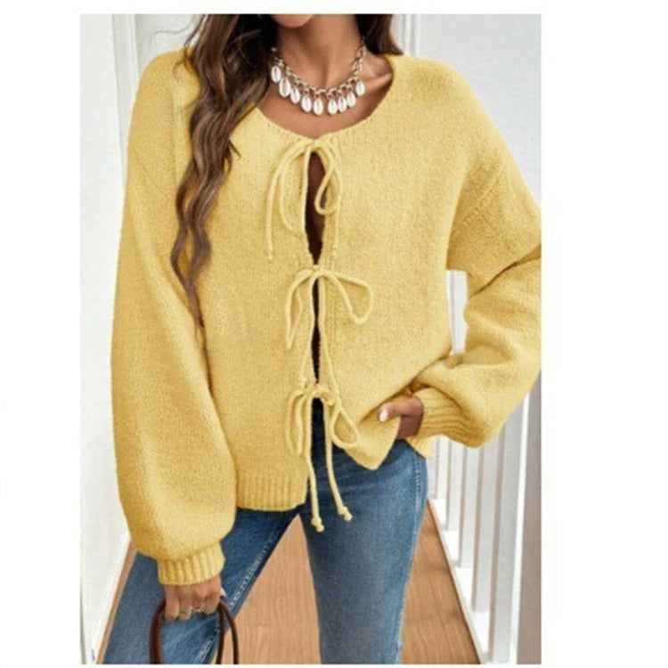 Women's knit sweater with a decorative lace-up design and casual balloon sleeves Lune London