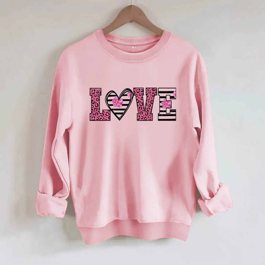 Sweatshirt femme avec design moderne de cœur léopard et coupe confortable Chic & Stil