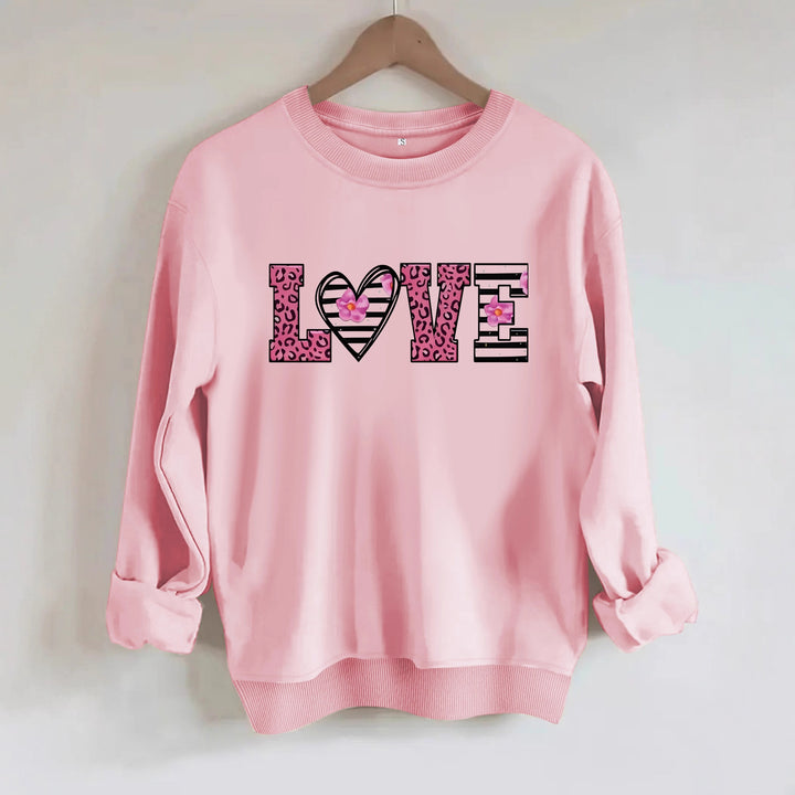 Sweatshirt femme avec design moderne de cœur léopard et coupe confortable Chic & Stil