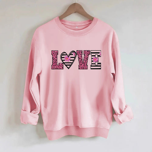 Sweatshirt femme avec design moderne de cœur léopard et coupe confortable Chic & Stil