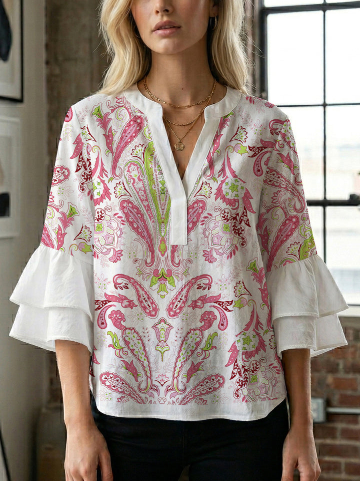 Ladies elegant top with voluminous ruffle hems and floral design Lune London