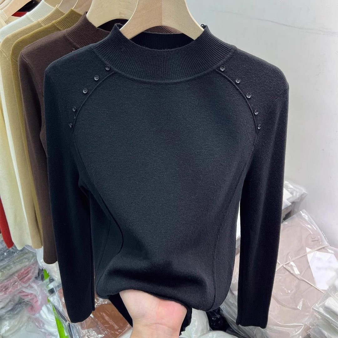 Elegant sweater for women with button details and high collar Lune London