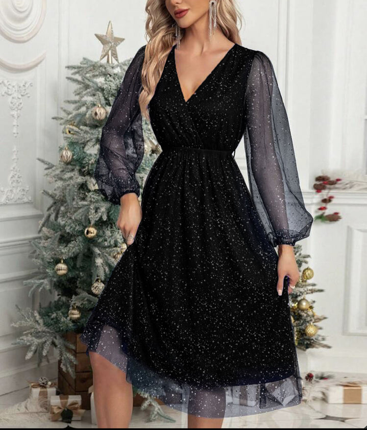 Glamorous midi dress for women with transparent puff sleeves and a sparkling sequin pattern Lune London