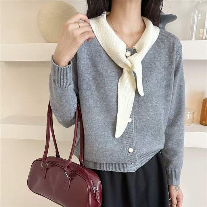 Fashionable women's cardigan with decorative scarf and button details Lune London