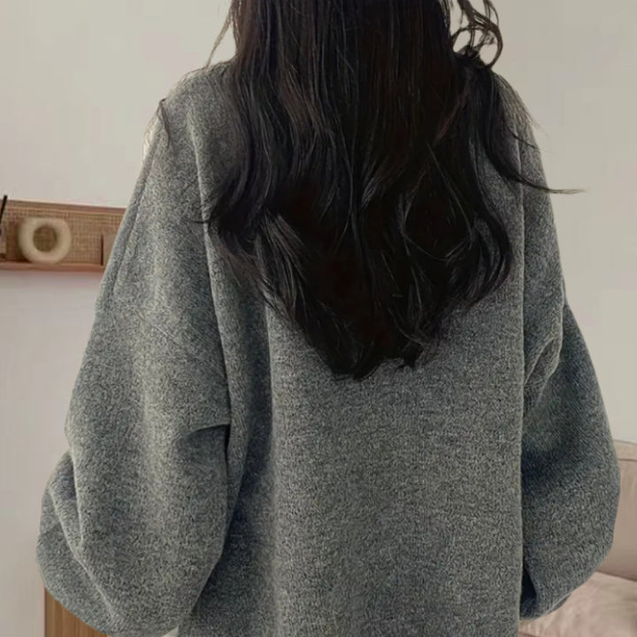 Oversized knit sweater for women with elegant puff sleeves and a modern design Lune London