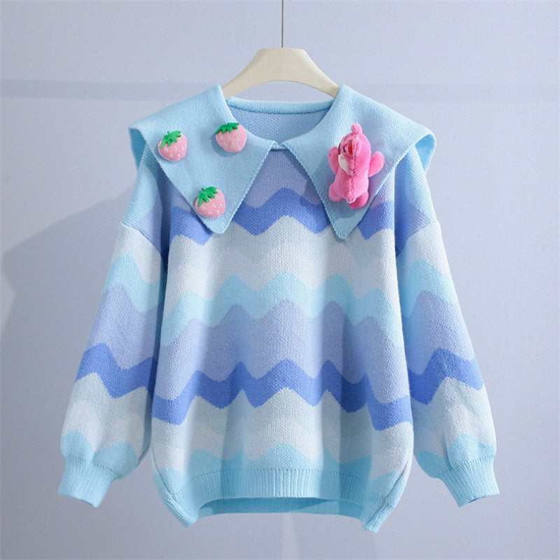 Knitted sweater for women with playful appliqués and a wave pattern Lune London