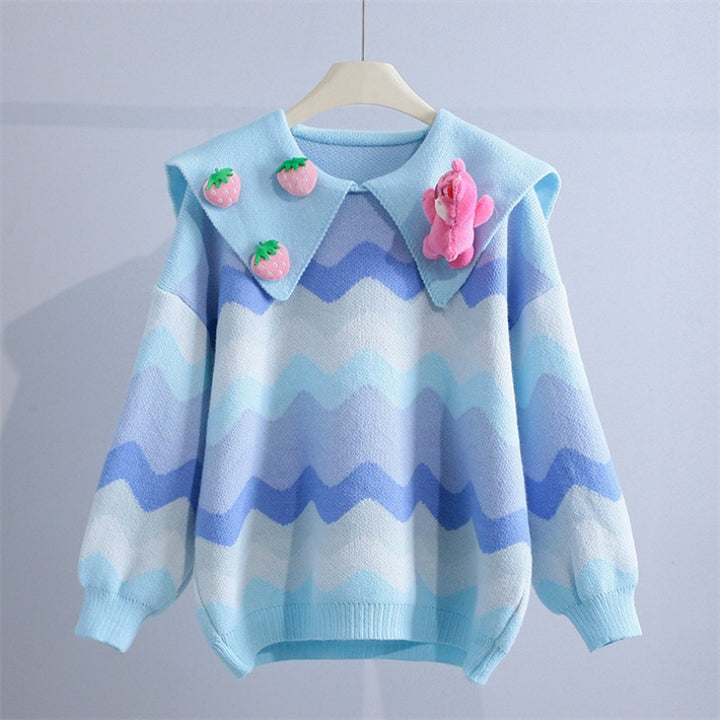 Knitted sweater for women with playful appliqués and a wave pattern Lune London