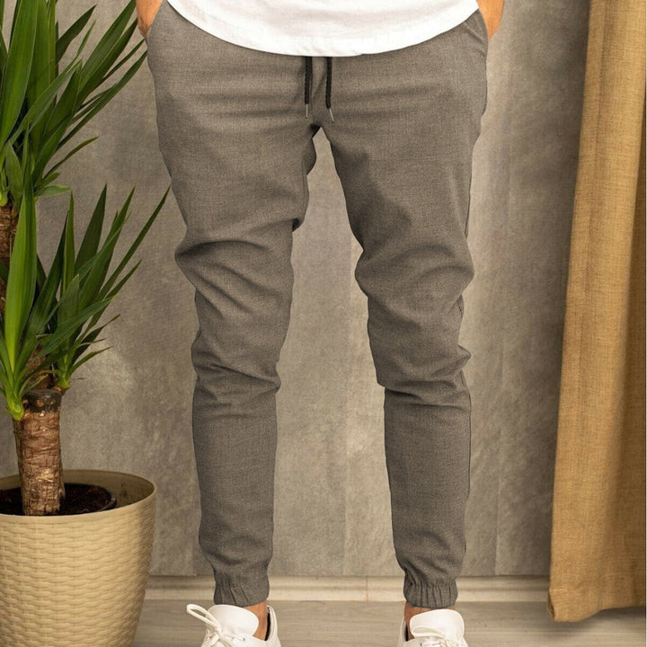 Men's Slim Fit Jogging Pants with Elastic Waistband and Practical Side Flap Pockets Lune London