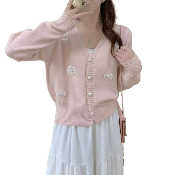 Ladies cozy knit vest with flower embroidery and pearl buttons Lune London