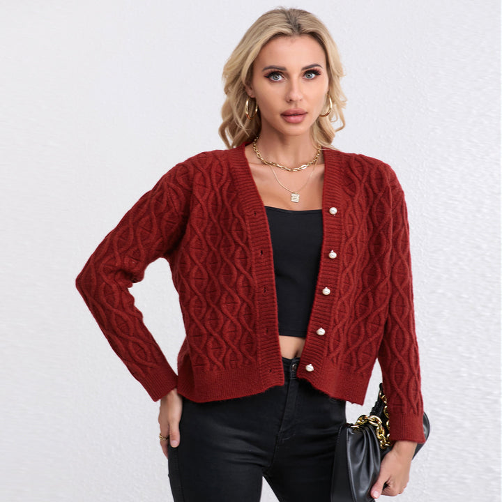 Women's knit jacket with modern cable pattern and pastel button details Lune London