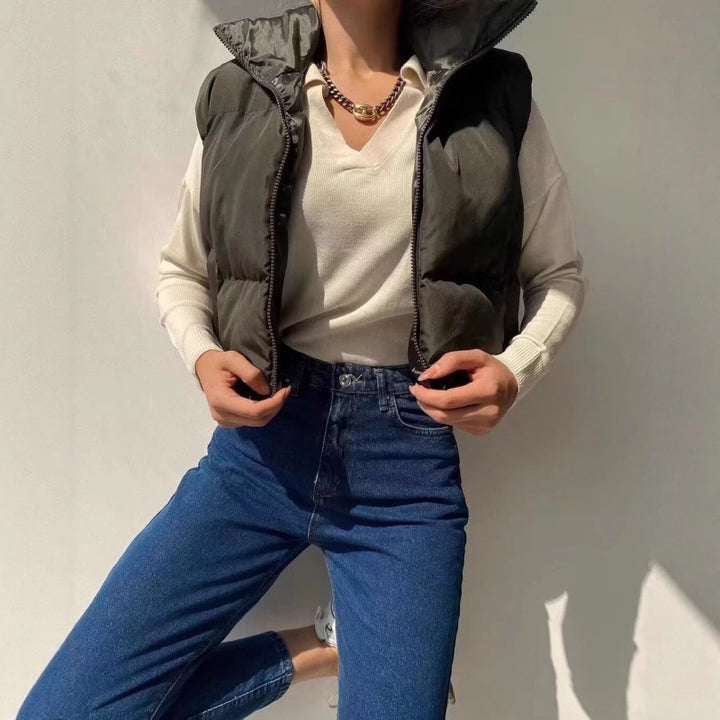 Quilted vest for women with high collar and practical pockets Lune London