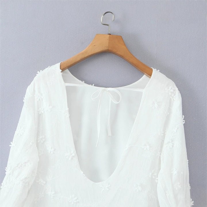Airy blouse dress for women with floral embroidery and ruffled sleeves Lune London