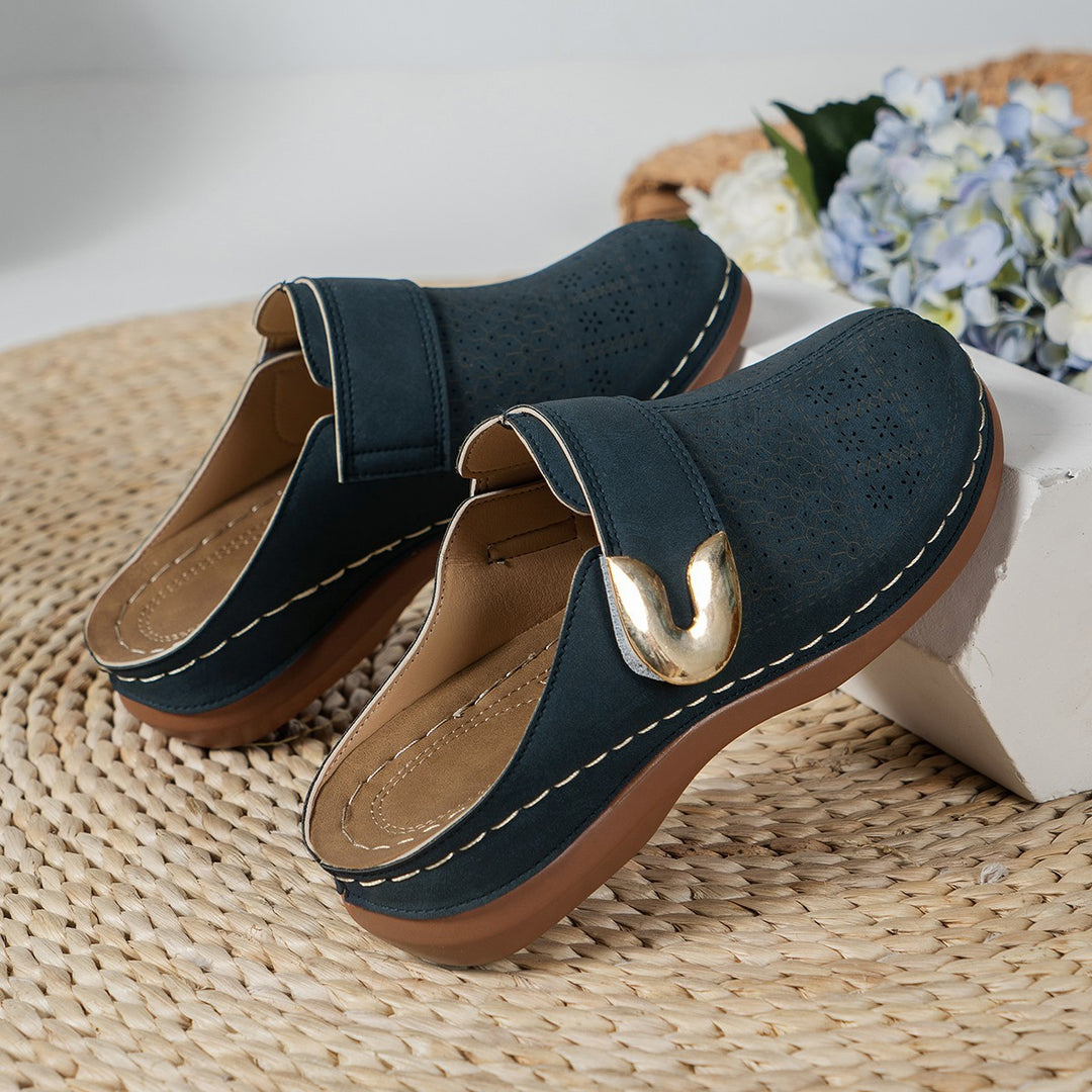 Women Breathable Clogs with trendy perforations and an adjustable strap Lune London