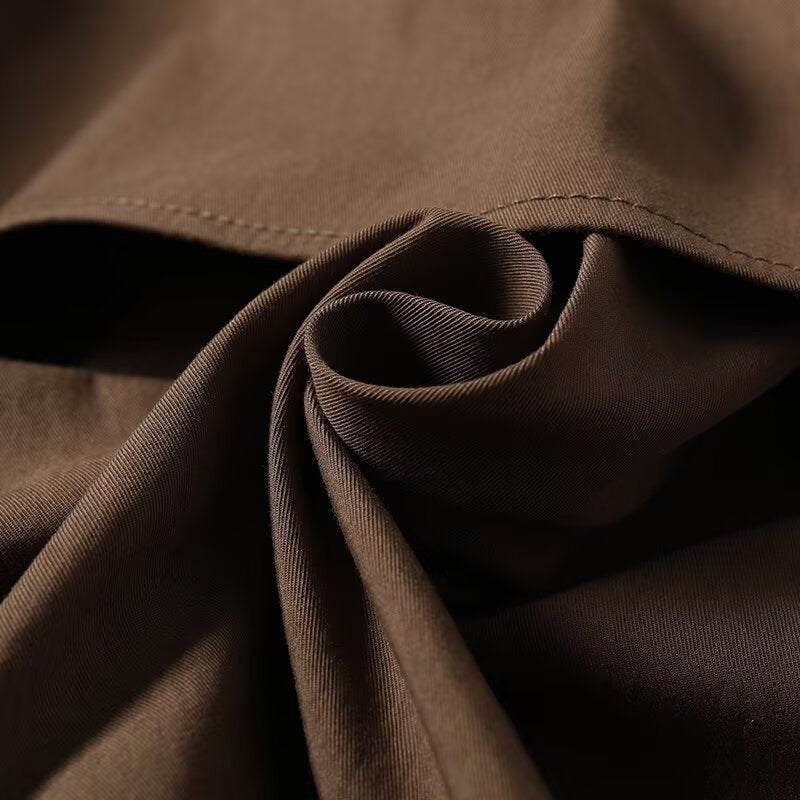 Trendy oversized trench coat for women with double-breasted closure and tie belt Lune London