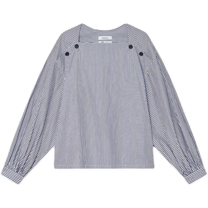 Blouse féminine à la mode avec des détails de bouton innovants Chic & Stil