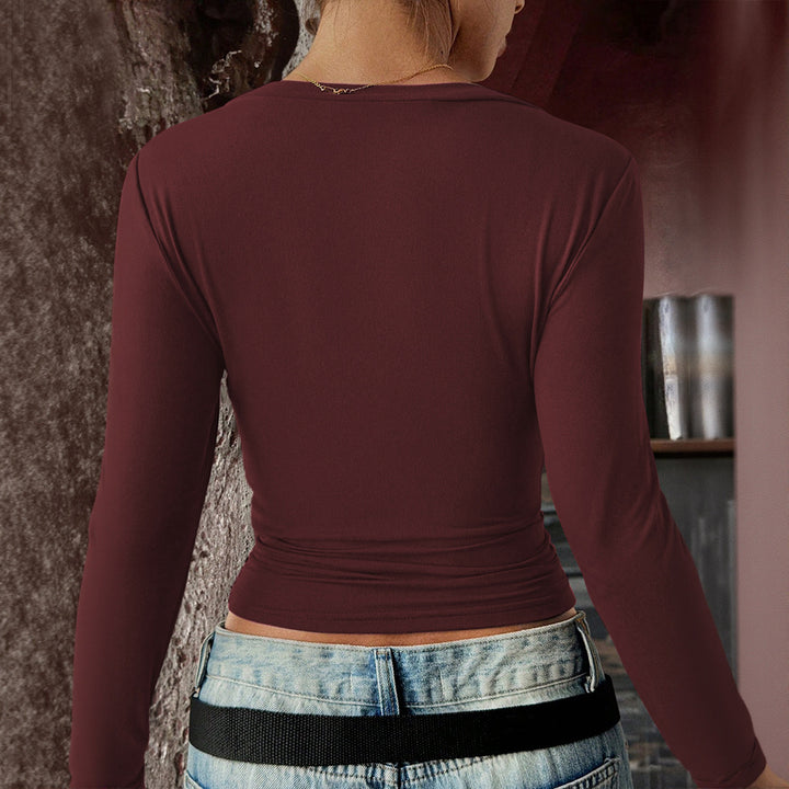Chemisier ajusté à manches longues pour femmes avec col en V et matériau élastique Chic & Stil