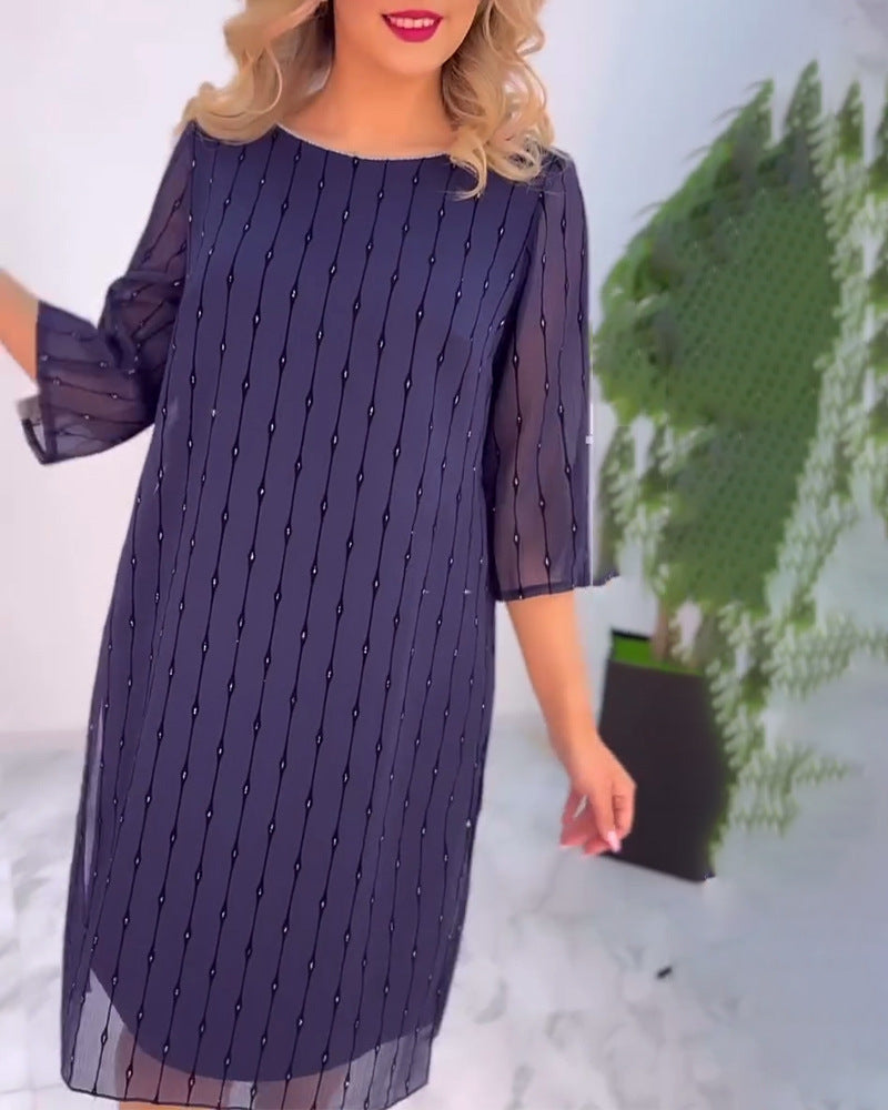 Robe de gala pour femmes avec des manches transparentes et des détails perles subtils Chic & Stil