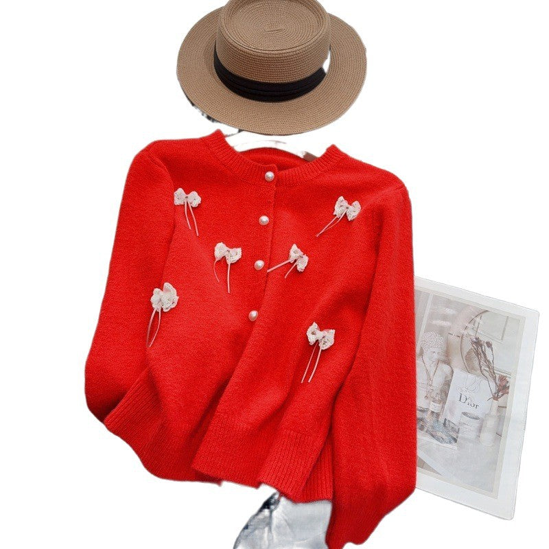 Knit jacket for women with feminine appliques and chic button details