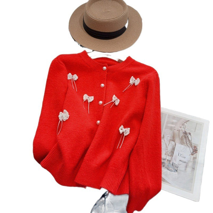 Knit jacket for women with feminine appliques and chic button details