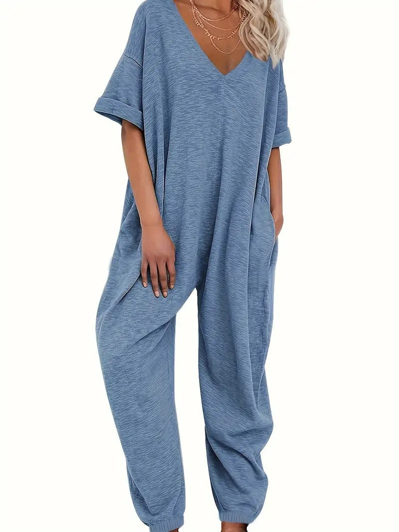 Oversized jumpsuit for women with deep V-neckline and casual pockets Lune London