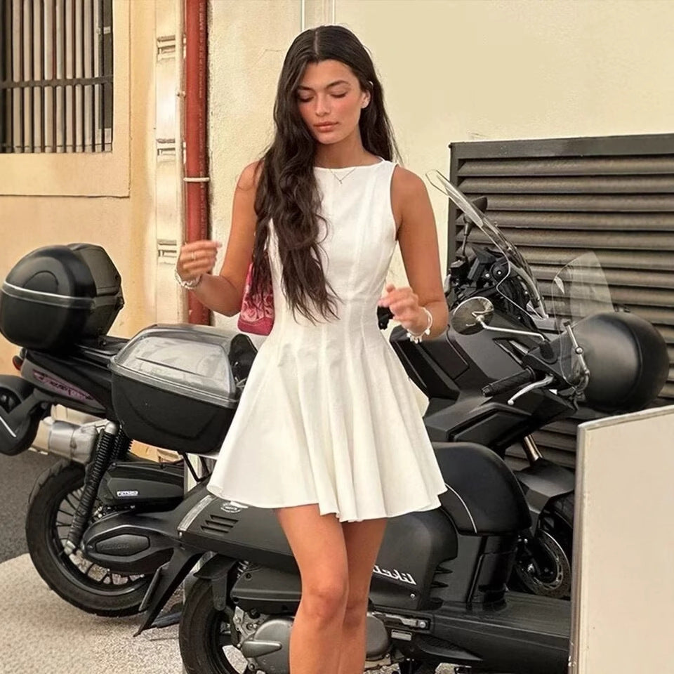 Women's sleeveless summer dress with a high cut and an elegant hem Lune London