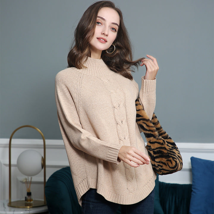 Chunky knit sweater for women with a high collar and cable patterns Lune London