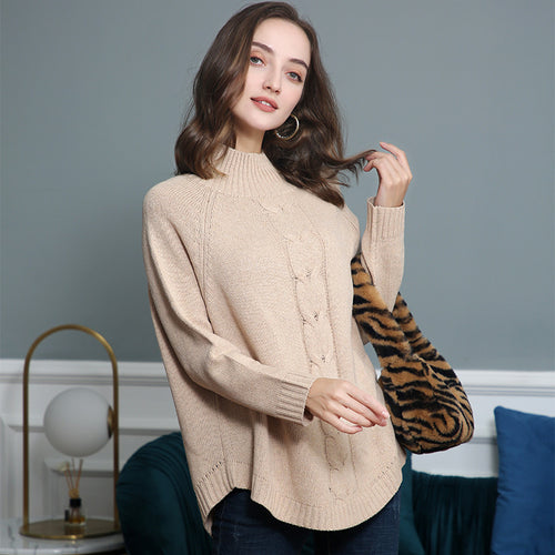 Chunky knit sweater for women with a high collar and cable patterns Lune London